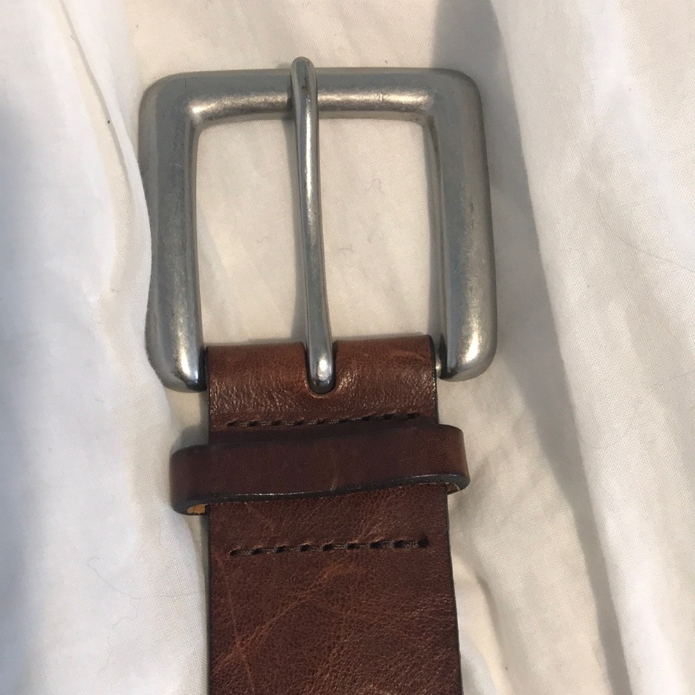 Beautiful brown leather belt with solid brass belt buckle